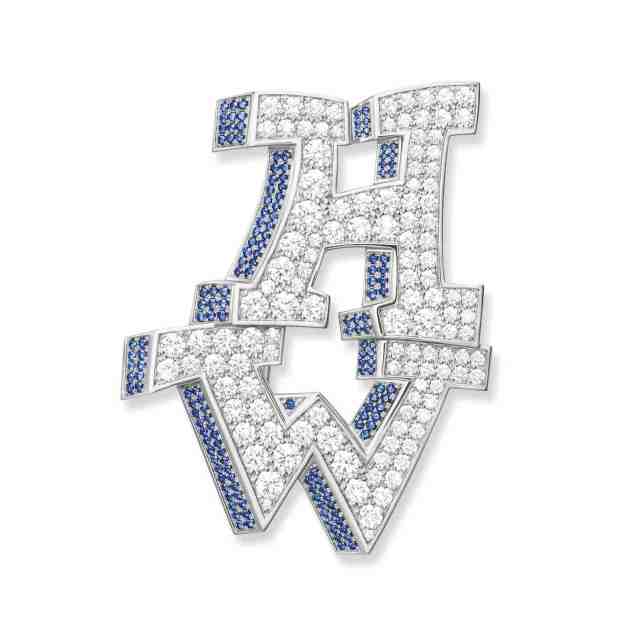 From the house of Harry Winston’s New York Graffiti Collection the H.W. brooch in sapphires and diamonds