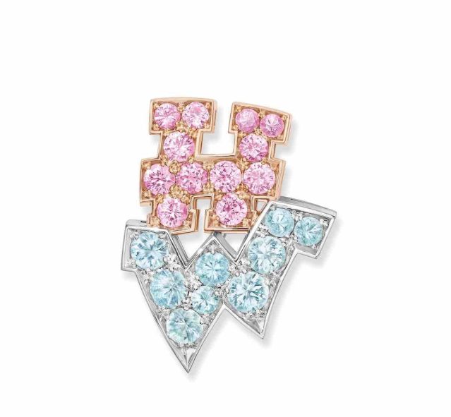 Harry Winston’s New York graffiti collection the H.W. brooch in pink sapphires and Paraíba tourmalines.
